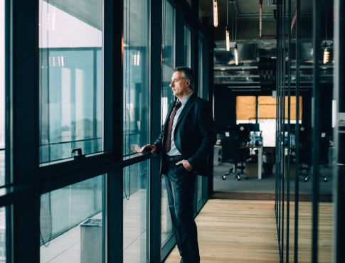 business man overlooking city